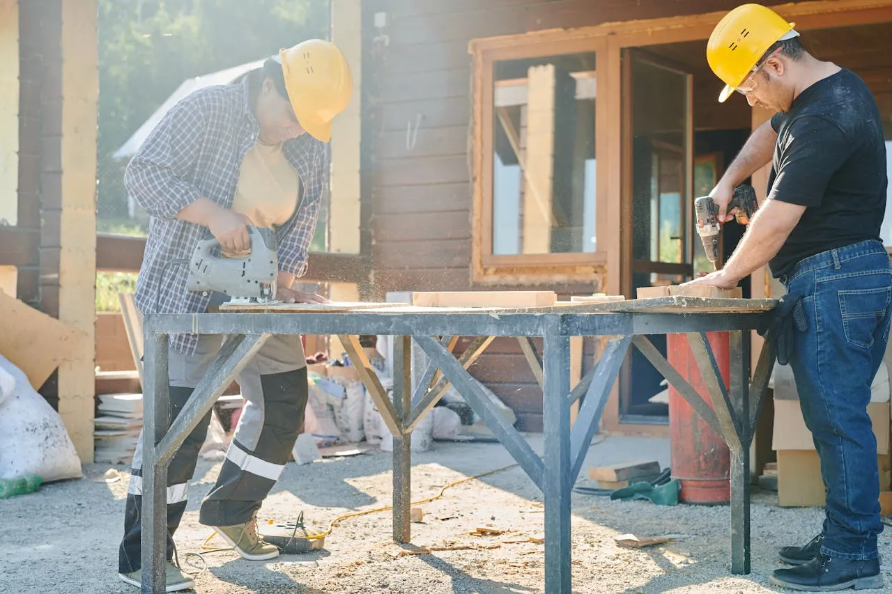 Construction workers in hard hats building together celebrating Labour Day and workers rights in New Zealand